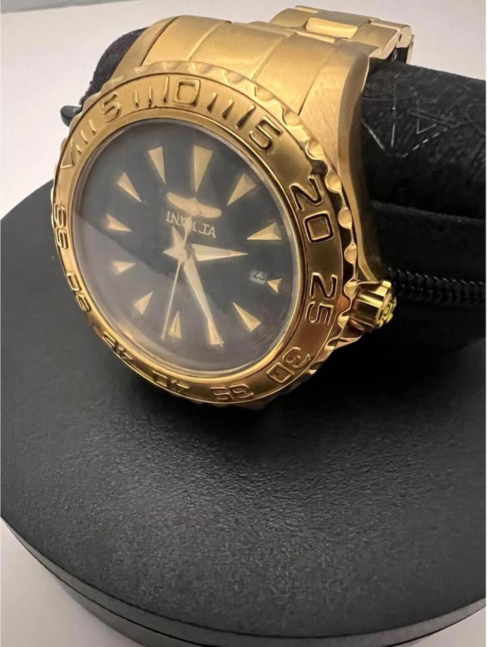 Vintage Invicta golden tone mechanical, self winding automatic watch
